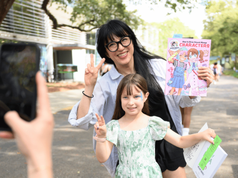 Misako Rocks! with a young reader at the 2026 New Orleans Book Festival at Tulane University. 