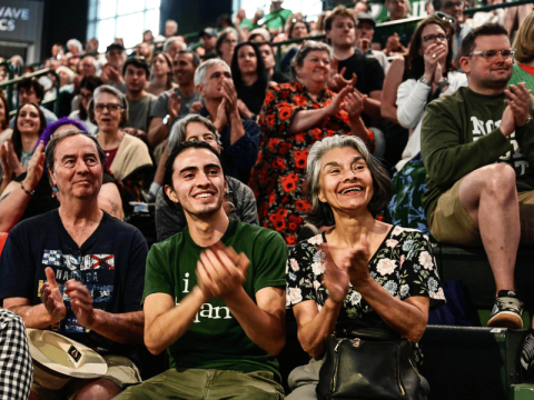 Audience smiling and clapping enthusiastically at 2026 New Orleans Book Festival at Tulane University. 