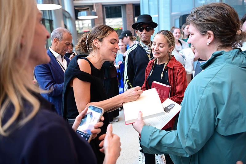 Cleo Wade & Nicole Ritchie interacting with festival attendees. Cleo Wade & Nicole Ritchie interacting with festival attendees.