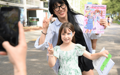 Misako Rocks! with a young reader at the 2026 New Orleans Book Festival at Tulane University. 